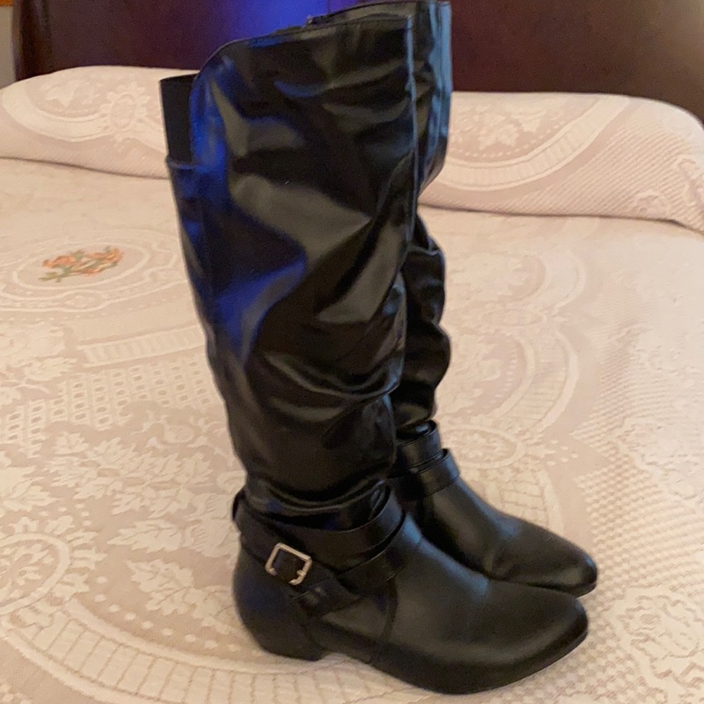 Knee high black boots